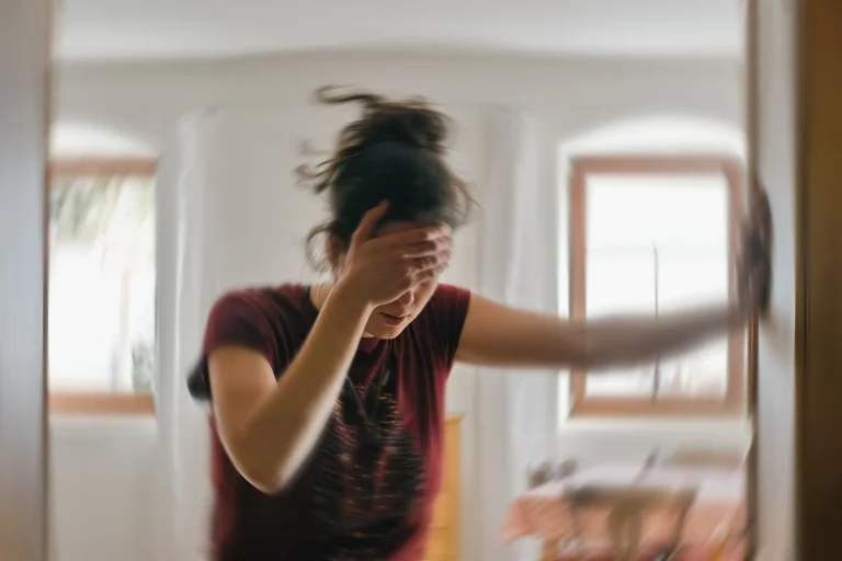 Steadying against a wall as the room moves, how vertigo actually arrives